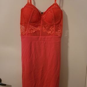 Spaghetti strap knee length dress. Coral